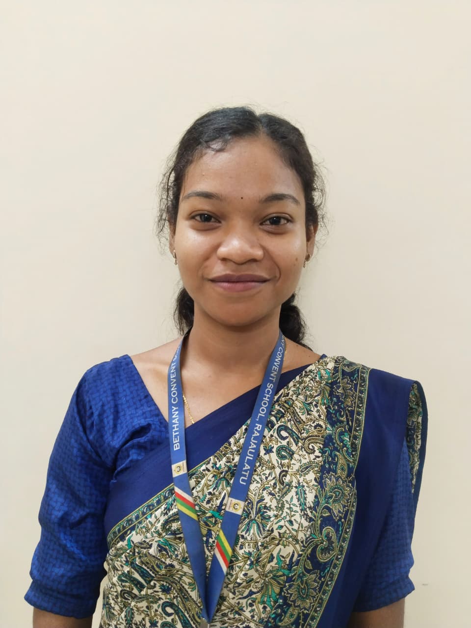 Ms. Subhasini Runda (B.Com, D.El.Ed)